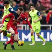 Sunderland's Jobe Bellingham (left) and Middlesbrough's Jonny Howson battle for the ball during the Sky Bet Championship match at the Riverside Stadium earlier this month. Picture: Owen Humphreys/PA Wire.