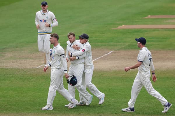 Joe Root is congratulated on taking the wicket of Colin Ingram. Picture by Alex Whitehead/SWpix.com