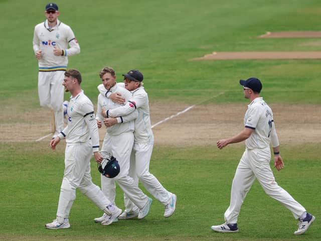 Joe Root is congratulated on taking the wicket of Colin Ingram. Picture by Alex Whitehead/SWpix.com