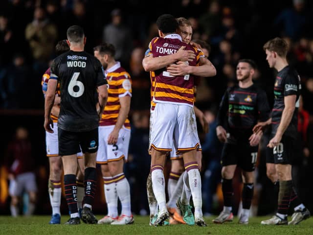 Bradford City duo Jonathan Tomkinson and Ciaran Kelly celebrate at full time after the EFL Trophy win over Doncaster Rovers. Picture: Bruce Rollinson.