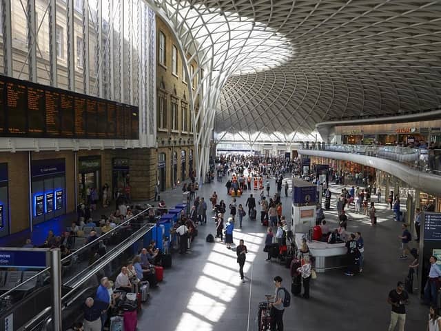Travellers at London's Kings Cross train station. (Pic credit: Niklas Halle'n / AFP via Getty Images)
