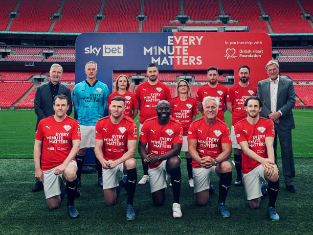 Kick-off: The Re-Starting 11 including players like Fabrice Muamba, front centre, David Ginola, next to him, and members of the football community like Claire Bailey, back row, middle, who are all here today thanks to CPR being successfully administered.