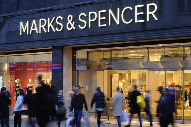 Marks & Spencer has said more than 9,200 shop workers are set to get bumper payouts under a share scheme as it revealed a jump in festive sales. (Photo by Charlotte Ball/PA Wire)