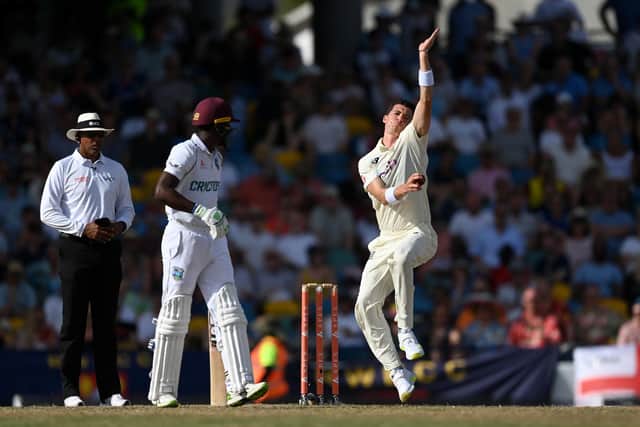Fisher in action on his Test debut in Barbados. Photo by Gareth Copley/Getty Images.