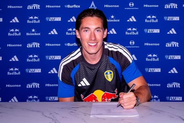 GETTING IT IN WRITING: Harry Wilson puts pen to paper on a four-year deal at Leeds United (Image courtesy of Leeds United)