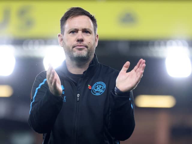 NORWICH, ENGLAND - NOVEMBER 02: Michael Beale, Manager of Queens Park Rangers applauds fans after the Sky Bet Championship between Norwich City and Queens Park Rangers at Carrow Road on November 02, 2022 in Norwich, England. (Photo by Stephen Pond/Getty Images)