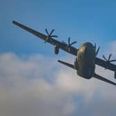 A Hercules military plane flying over the Upper Derwent Valley in the Peak District near Sheffield. Photo: Richard Bowring