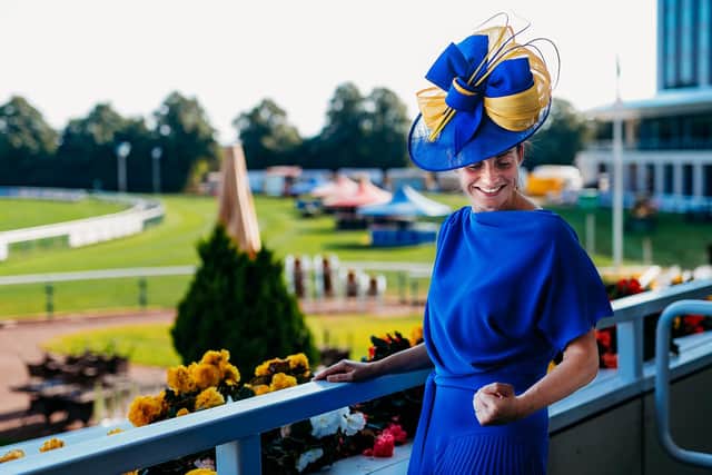 "I am incredibly proud to have the privilege of showcasing this stunning bespoke hat on Ladies' Day at the Betfred St Leger Festival. This hat is not just a fashion statement, it represents the unity and strength of our community here in Doncaster." Jessica Tugby-Andrew of Doncaster Rovers Belles on the bespoke hat for Ladies Day at the St Leger Festival.