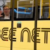 Greater Manchester mayor Andy Burnham views the 'Bee Network' buses at manufacturer Alexander Dennis in Larbert, Falkirk. PIC: Andrew Milligan/PA Wire