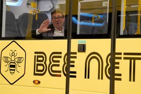 Greater Manchester mayor Andy Burnham views the 'Bee Network' buses at manufacturer Alexander Dennis in Larbert, Falkirk. PIC: Andrew Milligan/PA Wire