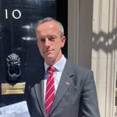 Clive Smith, chair of the Haemophilia Society, outside 10 Downing Street.