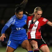 Eye on the ball: Sheffield United midfielder Bex Rayner, right, playing against Durham in the FA Women's Continental Tyres League Cup earlier this season. Tonight she makes her 100th appearance for the club. (Picture: Stu Forster/Getty Images)