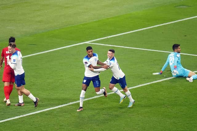 England's Marcus Rashford celebrates scoring his sides fifth goal with Phil Foden (Picture: Adam Davy/PA Wire)
