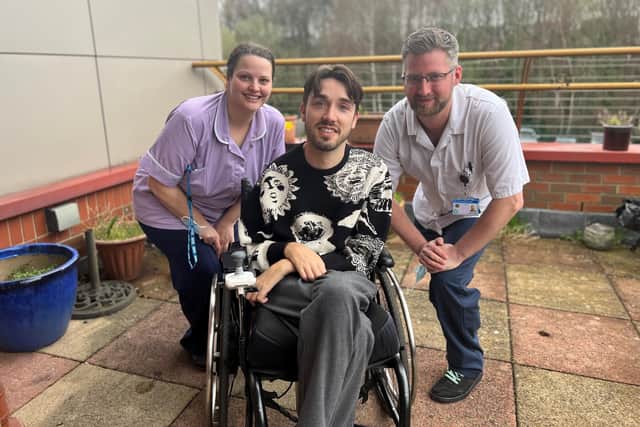 Sex Education actor George Robinson with members of the Sheffield spinal injury centre team.