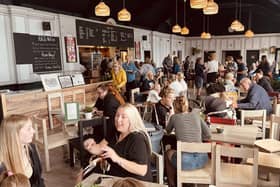 Customers enjoying the first day of opening of the Rose Garden Cafe in Graves Park, Sheffield. Picture: Andy Kershaw