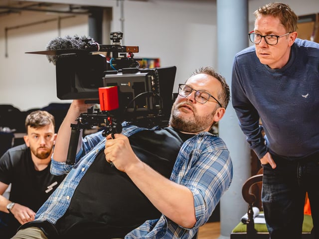 The creative team in rehearsals