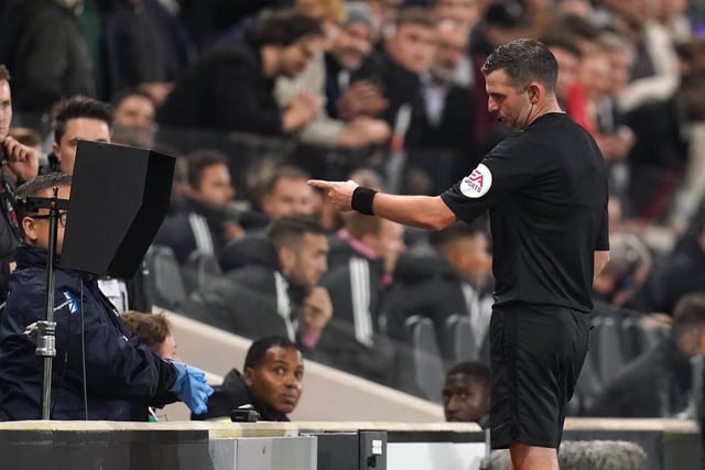 Two calls have went against Villa this season compared to one for. Above, Michael Oliver is pictured checking the pitch-side monitor before showing Douglas Luiz the red card for violent conduct against Fulham's Aleksandar Mitrovic.
