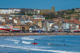 Surfers take to water on the South Bay of Scarborough.