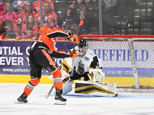 FINISHING ACT: Patrick Watling scores what proved to be the winning goal for Sheffield Steelers against Nottingham Panthers after Saturday night's game went to a shoot-out. Picture: Dean Woolley/Steelers Media.
