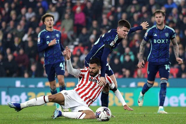 HARD TO TAKE: Stoke City's Mehdi Leris reacts to a challenge from Leeds United's Sam Byram at the bet365 Stadium Picture: Nigel French/PA