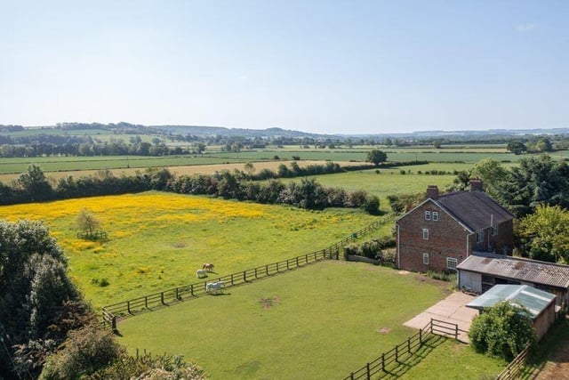 The property sits in 6.5 acres and has wonderful rural views