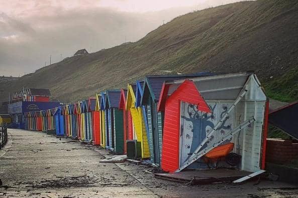At least one of the beach huts looks to have been completely destroyed