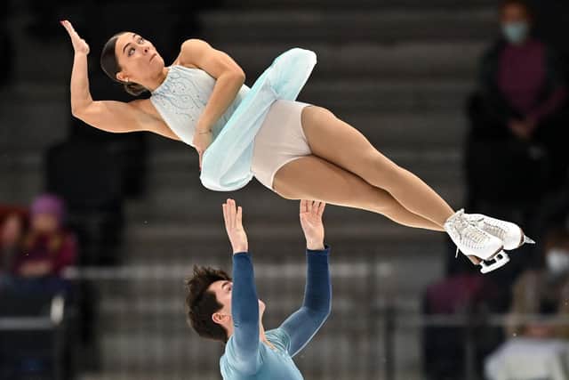 Britain's Anastasia Vaipan-Law and Luke Digby perform during the pairs's short program of the European Figure Skating Championship 2022 on January 12, 2022 in Tallinn. (Photo by Daniel MIHAILESCU / AFP)