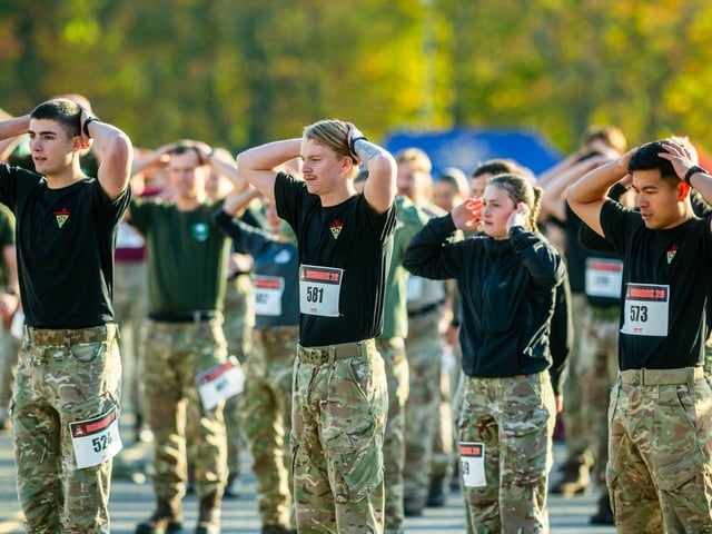 A row of soldiers competing.