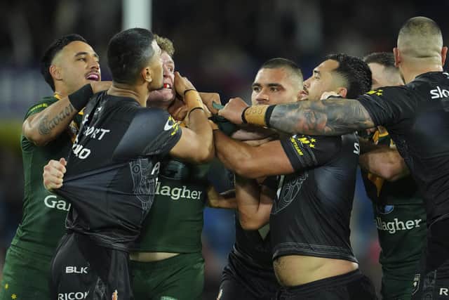 Players in a scuffle during a bruising contest. (Picture:AP Photo/Jon Super)