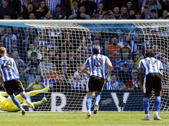 Sheffield Wednesday's Michael Smith scores their side's first goal of the game from a penalty during the Sky Bet League One match at Hillsborough Stadium, Sheffield. Picture date: Sunday May 7, 2023. PA Photo. See PA Story SOCCER Sheff Wed. Photo credit should read: Richard Sellers/PA Wire.RESTRICTIONS: EDITORIAL USE ONLY No use with unauthorised audio, video, data, fixture lists, club/league logos or "live" services. Online in-match use limited to 120 images, no video emulation. No use in betting, games or single club/league/player publications.