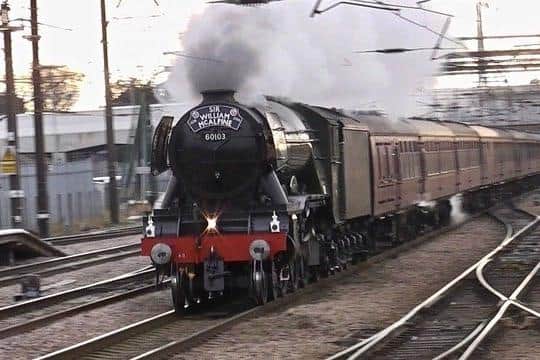 Flying Scotsman passing through Doncaster Station on a 2019 rail tour