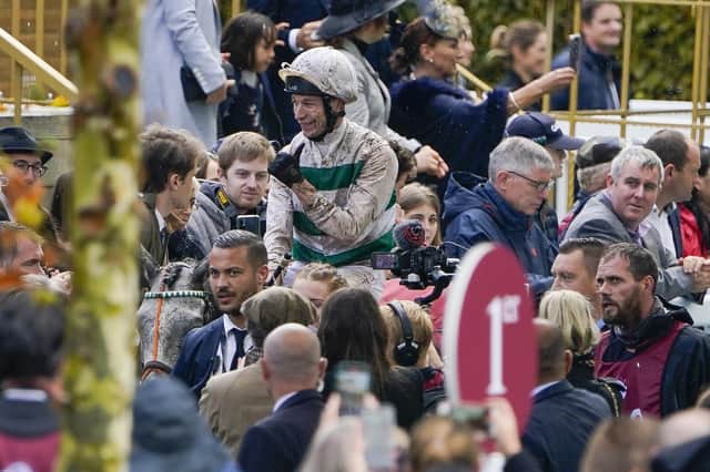 BIG PRIZE: Jockey Luke Morris - riding Alpinista - celebrates winning The Qatar Prix de l'Arc de Triomphe at Hippodrome de ParisLongchamp Picture: Alan Crowhurst/Getty Images