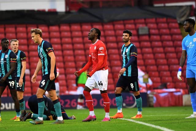 Barnsley striker Devante Cole celebrates his opener for the Reds against Crewe. Picture: Jonathan Gawthorpe.