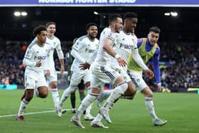 LEEDS, ENGLAND - FEBRUARY 25: Junior Firpo of Leeds United celebrates with team mates after scoring their sides first goal during the Premier League match between Leeds United and Southampton FC at Elland Road on February 25, 2023 in Leeds, England. (Photo by George Wood/Getty Images)