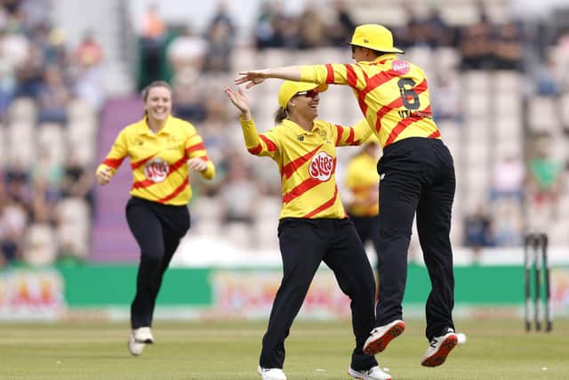Trent Rocket's Elyse Villani (right) celebrates with team-mates after catching the ball of Southern Brave's Sophia Dunkely during The Hundred Eliminator women's match at The Ageas Bowl, Southampton on Friday (Picture: PA)