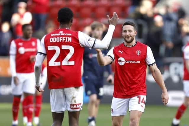 Rotherham United midfielder Hakeem Odoffin greets Conor Washington after the 4-0 win over Blackburn (Picture: Richard Sellars/PA)