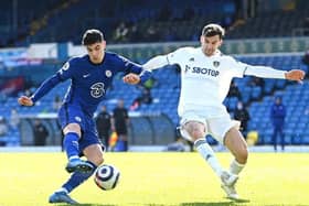 Chelsea and Germany forward Kai Havertz, left, pictured being closed down by Leeds United's Diego Llorente in a goalless draw at Elland Road in March 2021. Photo by Laurence Griffiths/Getty Images.