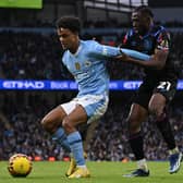 Manchester City's Norwegian midfielder #52 Oscar Bobb (L) vies with Huddersfield Town's English striker #21 Alex Matos (R) during the English FA Cup third round (Picture: Paul Ellis/AFP/Getty Images)