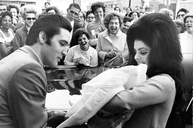Elvis Presley and Priscilla with Lisa Marie February 1968. 
 Picture  Alamy/PA.