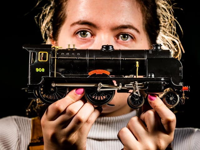 Auctioneer, Alice Cullen, holding Lot:3000 - Ace Trains '0' gauge - E/10 Schools Class 4-4-0 locomotive 'Westminster' No.908 and tender in SR Wartime black; boxed with instructions, original packaging.