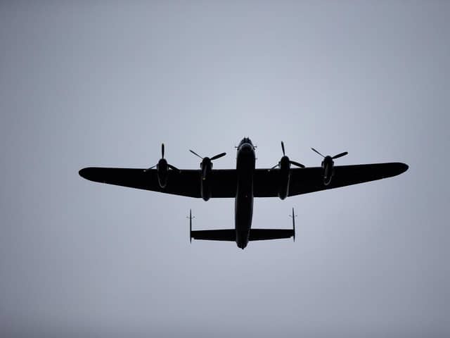 A Lancaster Bomber flies over Elland Vintage Fair, Elland Cricket Club. (Pic credit: Bruce Fitzgerald)