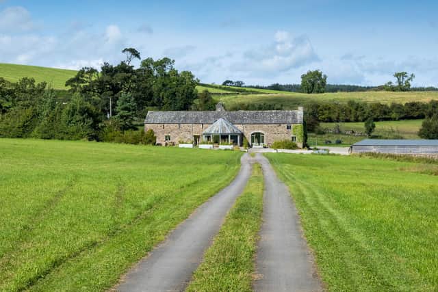 The family home on the farm retains its fire-places, stone floors and exposed beams and has five bedrooms, a utility, boot room, office, tv snug and living room.