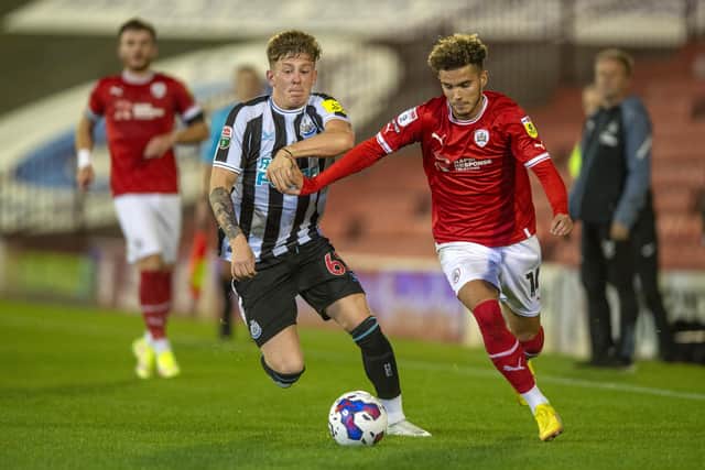 Barnsley's Josh Martin (right) and Newcastle's Jay Turner-Cook challenge for the ball in the recent EFL Trophy game. Picture Bruce Rollinson.