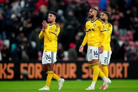 TOUGH DAY: Leeds United's James Justin, Lukas Nmecha, and Jayden Bogle enjoy their point (Image: Owen Humphreys)