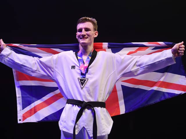 Bradly Sinden of Great Britain celebrates with his Gold medal after victory against Javier Perez Polo of Spain in the Final of the Mens -68kg during Day 3 of the World Taekwondo Championships at Manchester Arena on May 17, 2019 in Manchester (Picture: Laurence Griffiths/Getty Images)