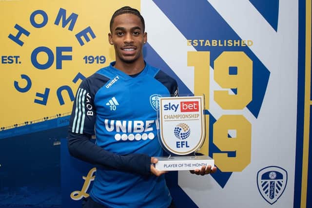 NICE PICTURE: Leeds United forward Crysencio Summerville with his Championship player of the month award for October