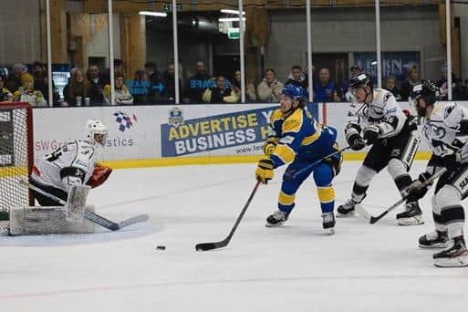 UP CLOSE: Leeds Knights' Mac Howlett goes close to beating Curtis Warburton in the Hull Seahawks' goal. Picture courtesy of John Victor.