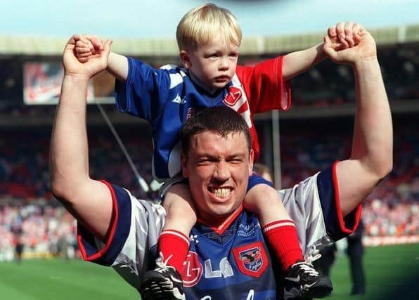 Mark Aston with his son Cory at Wembley. (Photo: Malcolm Russell)
