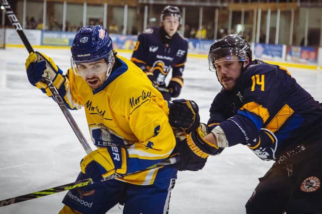 IN THE THICK OF IT: Ethan Hehir battles for possession on the boards in the 7-2 win over Raiders IHC on Sunday. Picture: Jacob Lowe/Leeds Knights