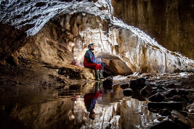 Richard Goodey, from Lost Earth Adventures, admiring the amazing internal cave structure of the Valley Entrance near Ingleton in the heart of the Yorkshire Dales. (Pic credit: James Hardisty)